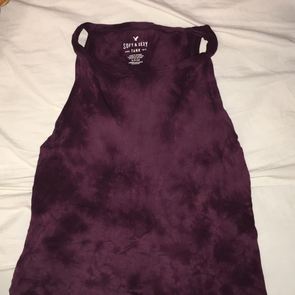 A dark purple tie dye tank top